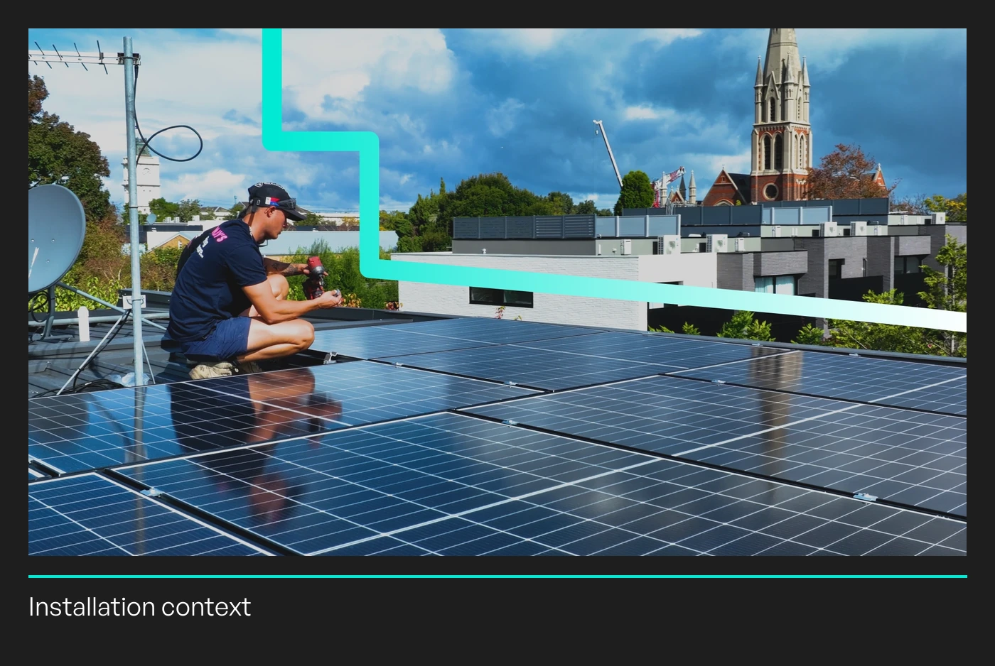 Installer working beside rooftop solar panels in an existing Lightning Energy photograph.