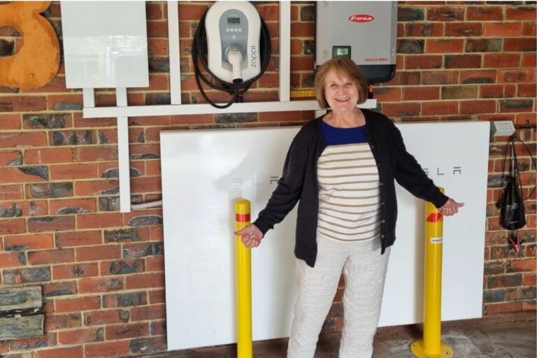 happy customer who has 2 tesla powerwall batteries installed at home