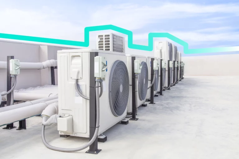 A row of AC condensers on a roof witht he Lightning Gradient ribbon going around the outline of the units and the roof