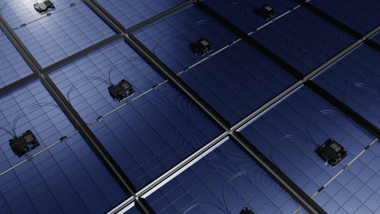 an image of a grid of REA Fusion panels with the backside showing with the Enphase microinverter attached